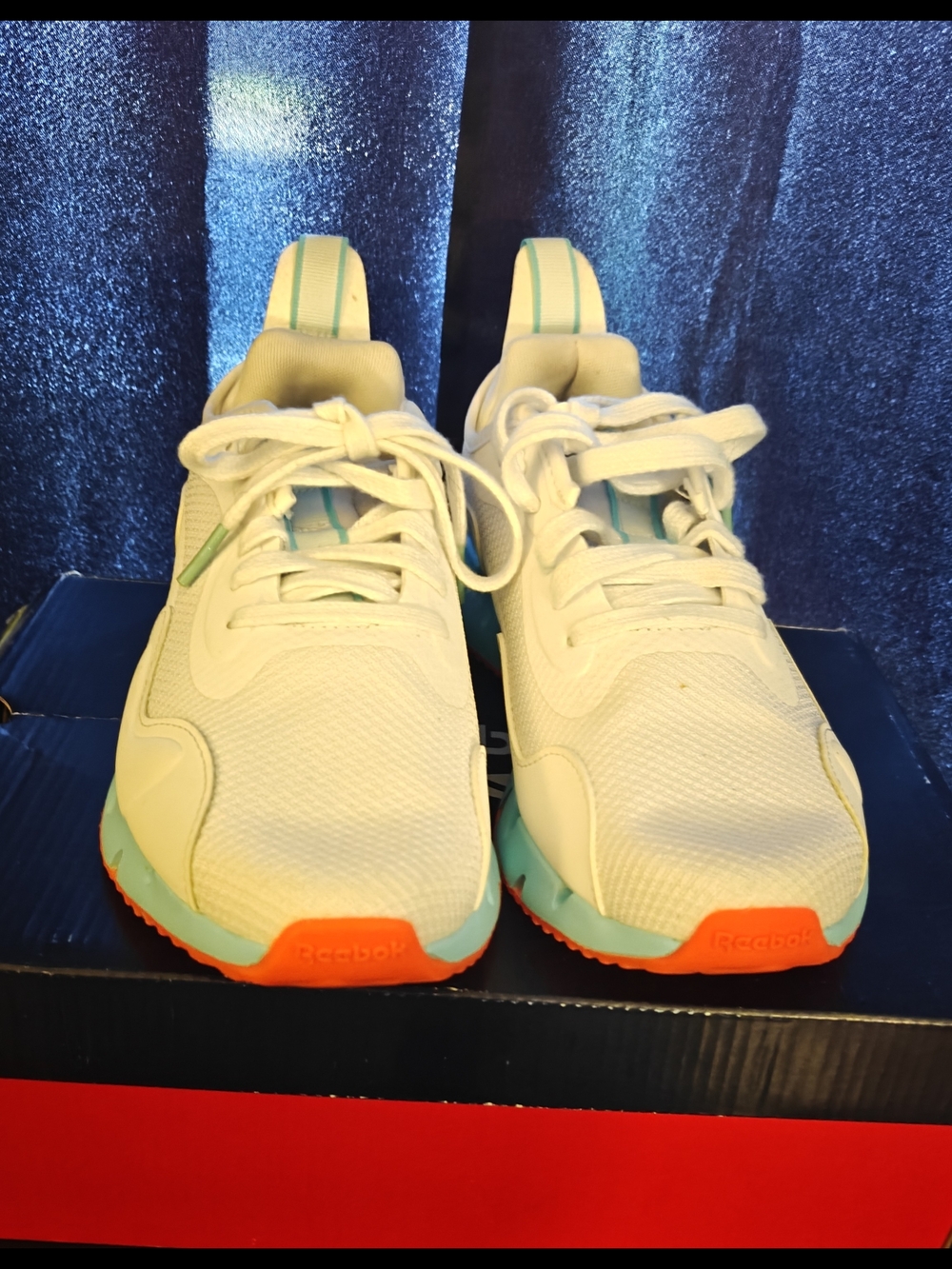 Reebok White Athletic Sneakers with Teal and Orange Accents